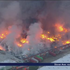 Commerce industrial building engulfed by 3rd-alarm blaze
