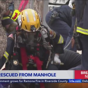 First responders pull woman rescue woman trapped down manhole in O.C.