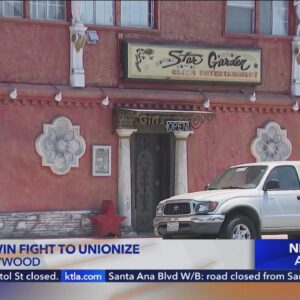 Strippers win fight to unionize