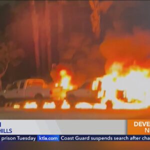 Jeep smashes into parked trucks, creating vehicle fire before rolling over twice in Woodland Hills