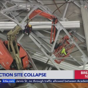 Workers trapped after construction site collapse