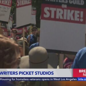 Writers picket Warner Brothers, Disney, CBS and more as strike begins