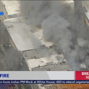 Fire crews battle large structure fire in downtown Los Angeles