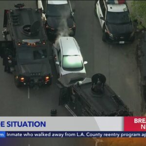 SWAT team attempts to end barricade situation in Studio City