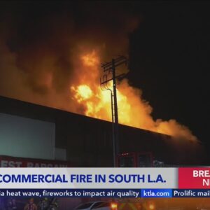 Massive fire breaks out at discount store in South Central L.A.
