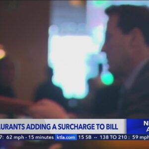 More restaurants are adding a surcharge to bill