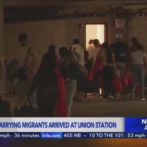 Another bus carrying migrants arrives at Union Station