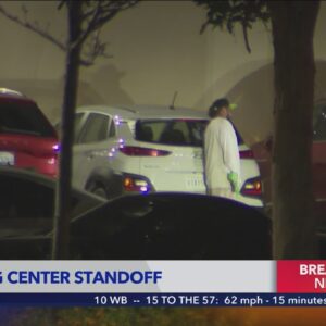 Armed suspect in hours-long standoff with police in Orange County