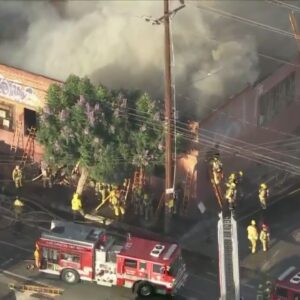 Large fire engulfs commercial building in South Los Angeles