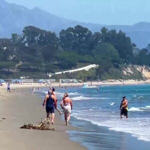 Locals beat heat wave on ocean waves