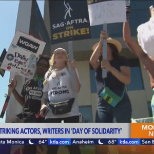 Writers, actors rally with other unions at Disney Studios