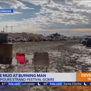 1 dead, thousands stranded at flooded Burning Man