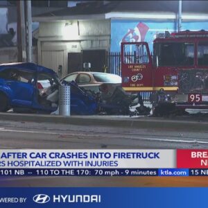 2 killed when car slams into firetruck; 4 firefighters hospitalized