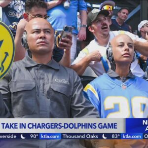 AI robot fans promoting new film seen at Chargers-Dolphins game
