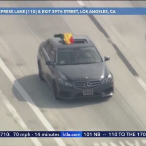 Stolen vehicle suspect's pants get stuck while trying to surrender after L.A. chase