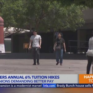 CSU workers rally for pay hike outside board’s tuition increase vote