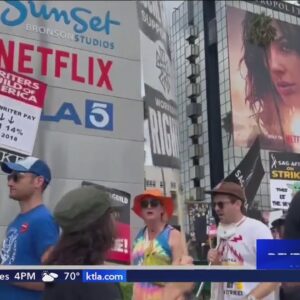 Optimism grows over possible agreement in Hollywood writers' strike but picketing continues