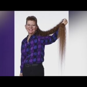 Woman sets record for longest mullet at 5' 8"