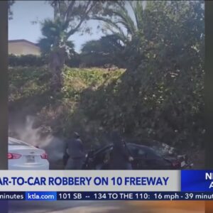 Chaotic car-to-car robbery on 10 Freeway caught on video
