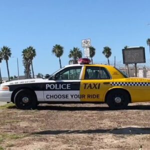 “Choose Your Ride” vehicle looks like a police car in the front and a taxi in the back