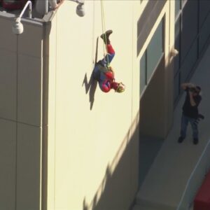 Superheroes rappel down Ventura County Medical Center to entertain hospitalized kids