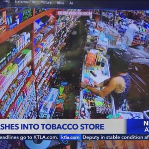 Security footage shows vehicle crash into tobacco store in Brea
