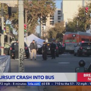 At least 2 dead after minivan involved in pursuit slams into bus  