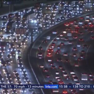 Holiday travelers hit the highways and airports