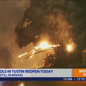Some schools in Tustin reopening as hangar fire continues to burn 