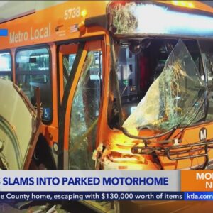 Metro bus slams into parked motorhome