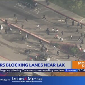 Several protesters taken into custody after blocking lanes near LAX 