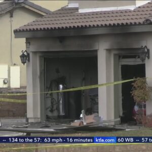 Woman's body found after garage fire at Lancaster home