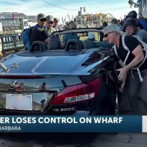 Good Samaritans help a driver who lost control of his car on Stearns Wharf