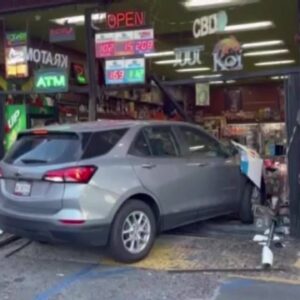 Car crashes into local smoke shop