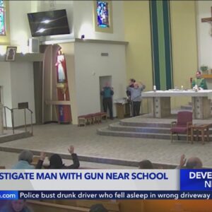 Possibly armed man taken into custody at church near school in Orange County 