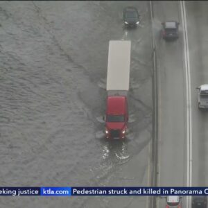 Flooding closes lanes, creates traffic nightmare on 405 Freeway in Long Beach