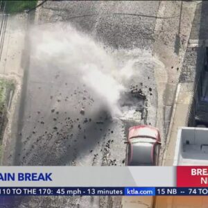 Pavement busted open during water main break in Studio City