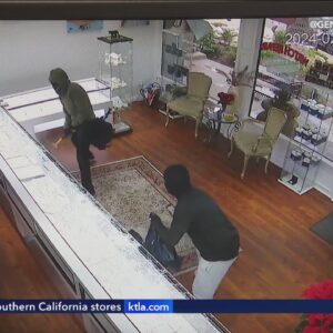 Employees at a jewelry store are shaken after shots are fired to try and deter smash-and-grab robber