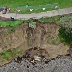 Storm damaged section of Shoreline Park falls to beach below