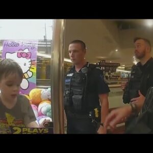 Toddler gets stuck in claw machine, Police break glass to get him out