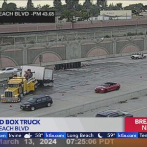 Fiery crash snarls traffic on 5 Freeway near Los Angeles-Orange County line 