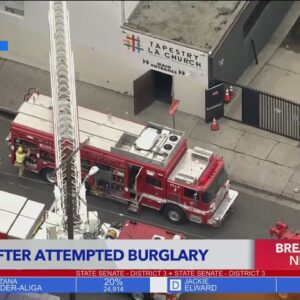 Man in custody after getting stuck behind brick wall in downtown Los Angeles