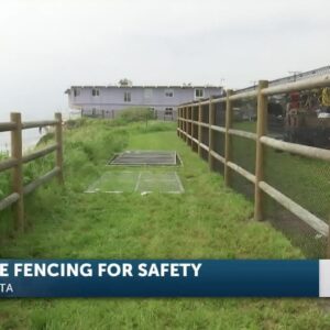 Taller fencing is going up on the Isla Vista cliffs