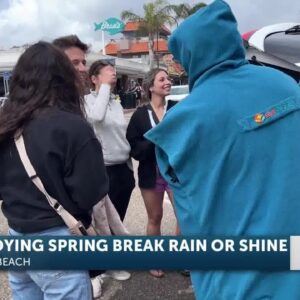 The gloomy clouds aren't keeping spring breakers from Pismo Beach
