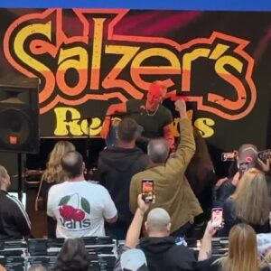 Def Leppard fans line up at Salzer’s Records to see guitarist Phil Collen play and sign ...