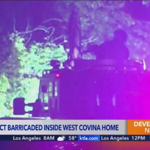 Armed suspect remains barricaded inside West Covina home