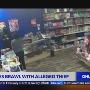 Employees brawl with alleged armed robber