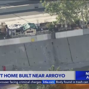 Makeshift home built along side 110 Freeway in L.A.