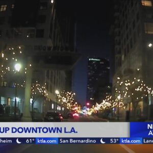 Businesses hopeful newly installed lights will help in revitalization of downtown Los Angeles