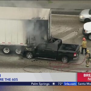Truck gets pinned under big rig trailer in fiery crash on Los Angeles Co. freeway